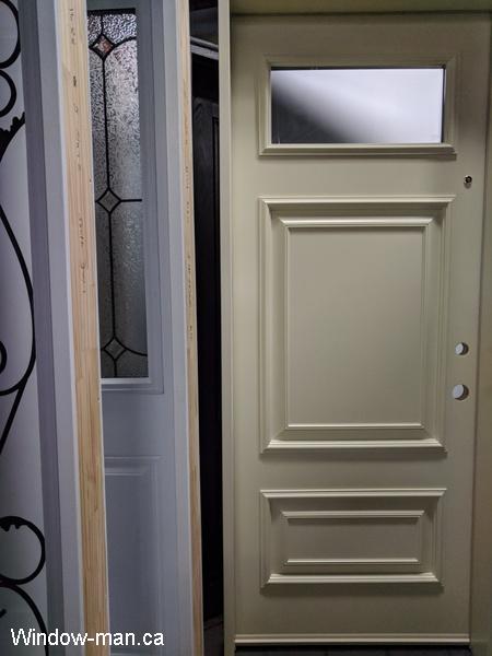 Single entry steel insulated prehung cream beige front door. Modern executive shaker style. Acid etched glass and Executive raised panels. 2-Panel one lite shaker style Door